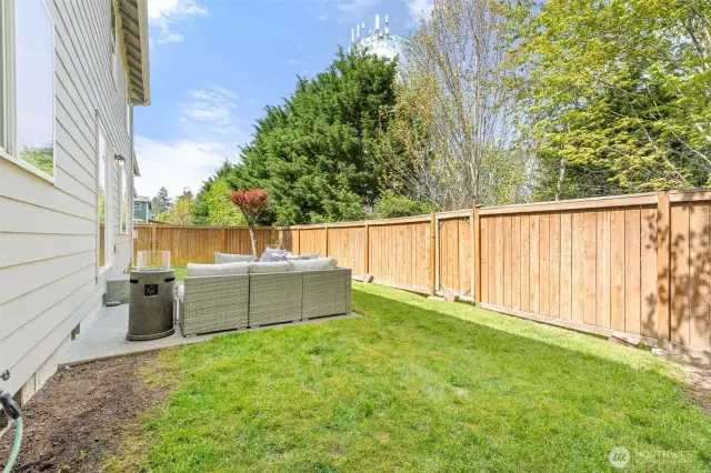 Private yard backing up to green space.