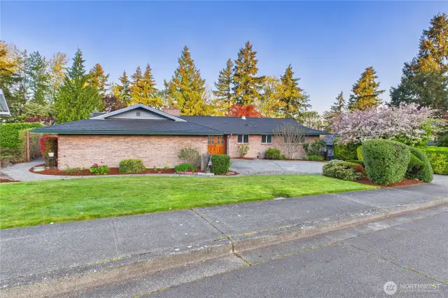 Nice landscaping surrounding this beautiful house