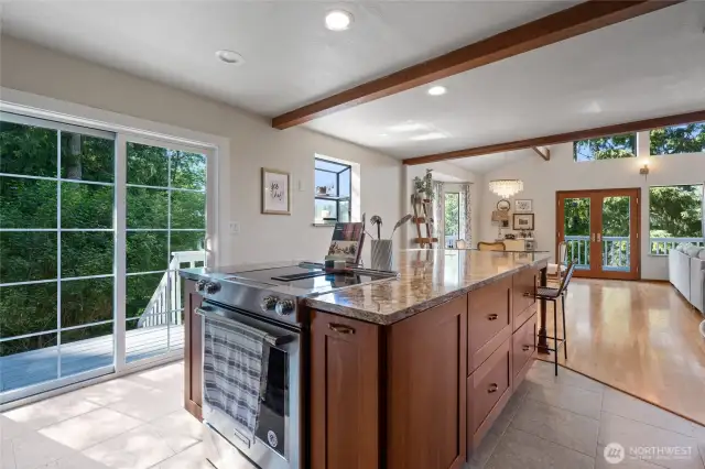 A stunning chef’s kitchen with an oversized island makes cooking a delight for anyone, combining style, functionality, and ample space for gathering.