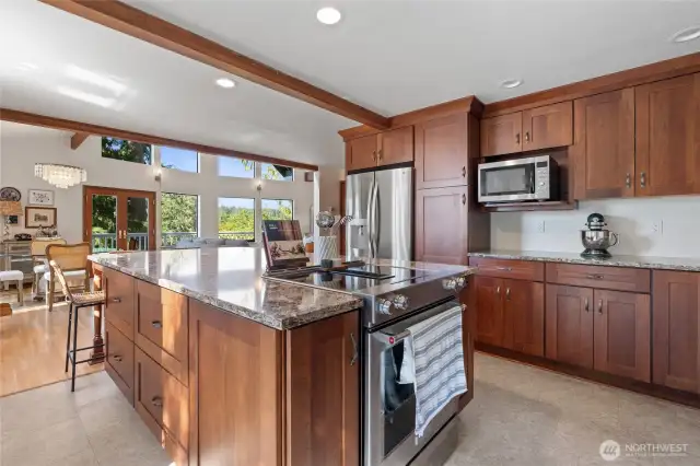 Featuring sleek stainless steel appliances and abundant counter space, this modern kitchen is designed for both everyday living and gourmet cooking.