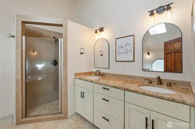 Elegant 5-piece ensuite bathroom connected to the primary suite, offering a perfect blend of convenience and luxury.