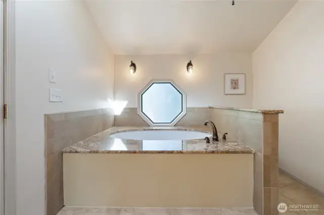 Unwind and soothe your muscles after a long day on the water with a relaxing soak in the spacious bathtub.