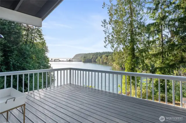 Imagine the fresh scent of pine and the peaceful sounds of wildlife from the comfort of this inviting deck.
