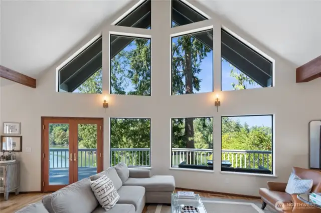Imagine golden sunsets cascading over the Olympic Mountains as the sun dips below the western horizon, filling your home with warm, natural light.