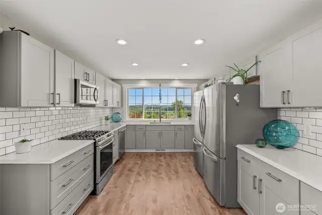 Kitchen with quartz Counters.