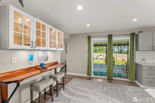 Breakfast Bar and Sliding glass door to porch.