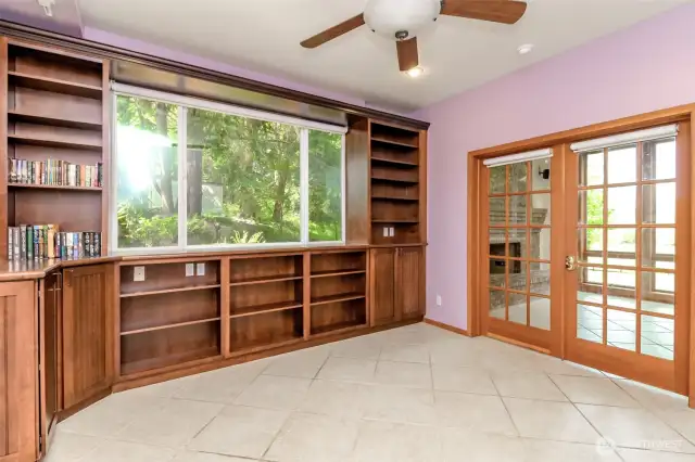 Den with beautiful built in cabinetry