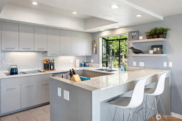 Tastefully updated, the kitchen offers an efficient and modern design.
