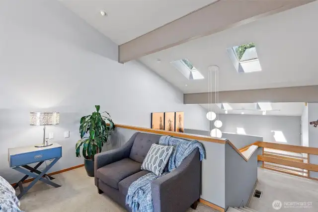The primary suite is an open loft, but offers ample privacy.