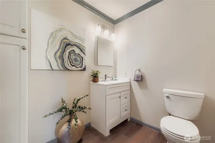 Quarter bathroom on first floor.