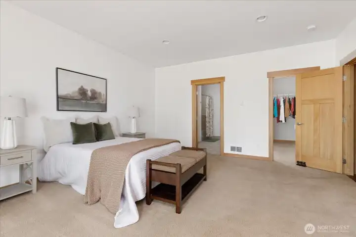 Primary Suite features two walk-in closets and a full en-suite bathroom.