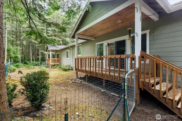 Back yard has two great decks and a fenced in area for small dogs.