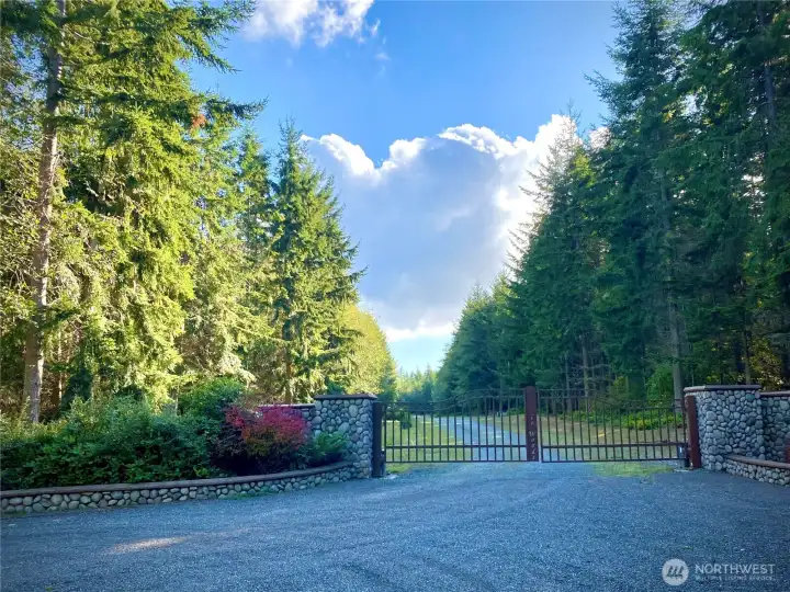 Gate to Parker Woods - Photo taken in the spring. HOA to mow sides and re-gravel shortly. (photo taken in spring)