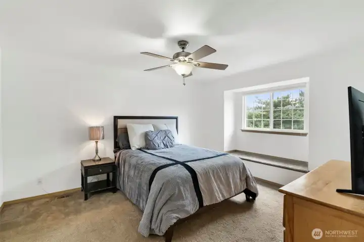 Spacious primary with bright window seat!