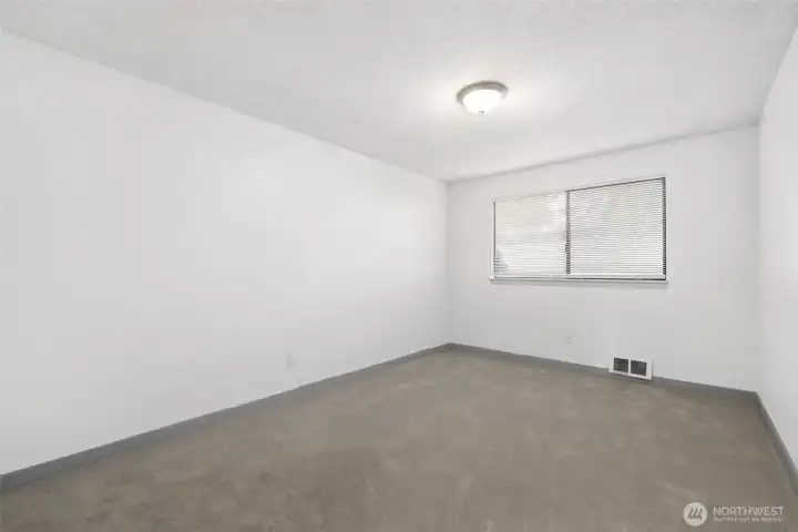 A fresh start, this bright space is ready for your personal touch
