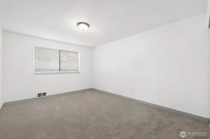 Primary bedroom is spacious and ready to go.