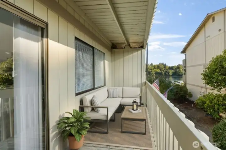 Virtual Staging. Your balcony retreat imagined as a beachy retreat to enjoy the sounds of waterfront living.