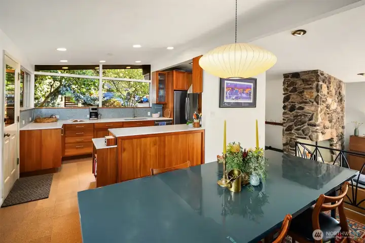 The dining room opens to the bright, welcoming kitchen.