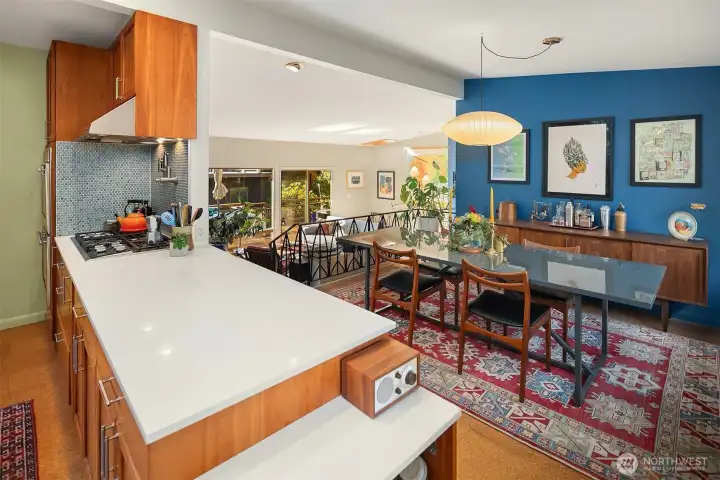 The open kitchen/dining/living space is perfect for entertaining.