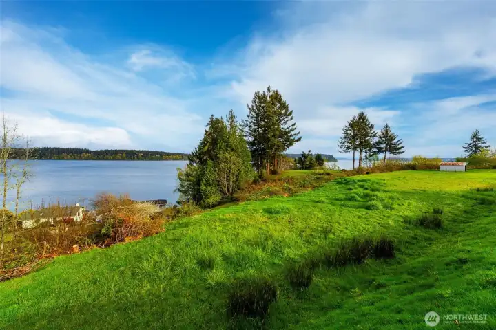From North end of lot (lower level) looking South. Views of the Sound and Anderson Island with Mt Rainier in the distant (not pictured here).