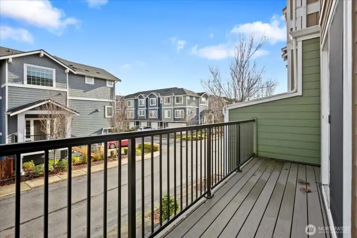 Second-level balcony overlooking the surrounding townhome community