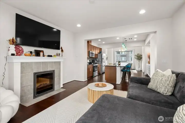 Open-concept layout connecting the living room to the kitchen and dining areas for effortless flow