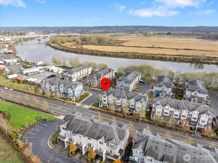 Shows the home nestled in a well-Beautifully positioned within a well-kept townhome community