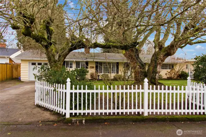 White picket fence welcomes you home.
