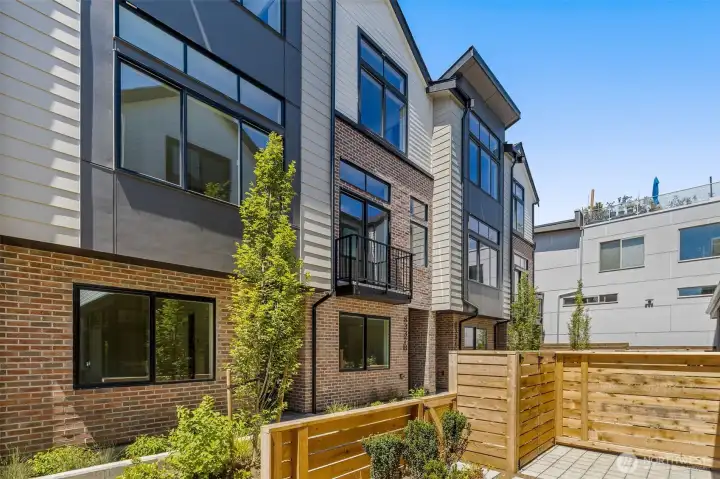 Community perspective highlights Willow’s carefully arranged residences designed to foster connection while maintaining privacy.