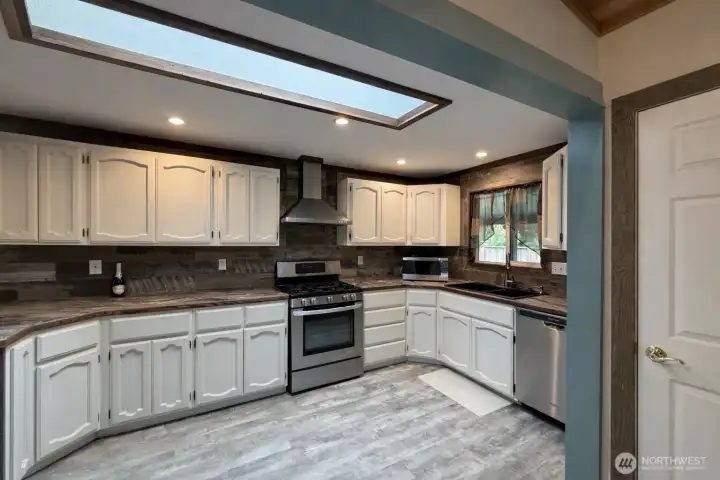Spacious kitchen with updated appliance. Perfect for entertaining.