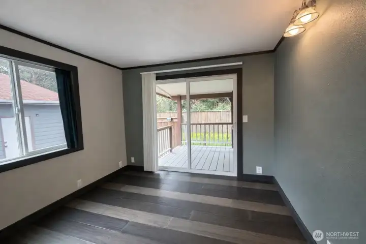 Bedroom with slider onto rear deck Bedroom with slider onto rear deck