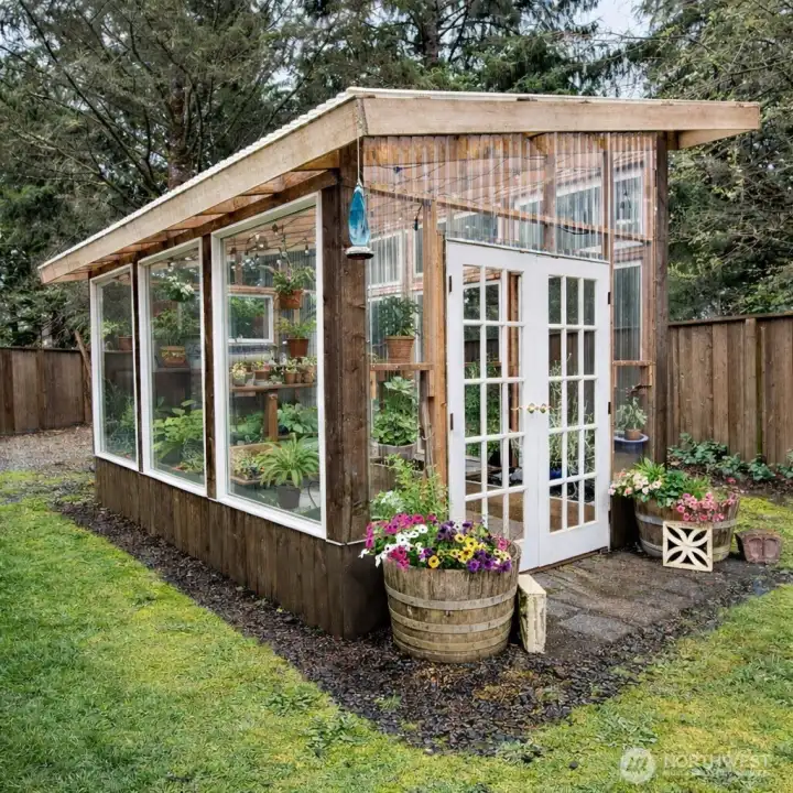 Grow your plants year round in this charming greenhouse