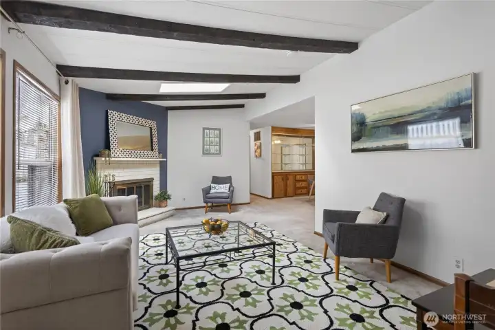 Living room towards dining room and primary bedroom..