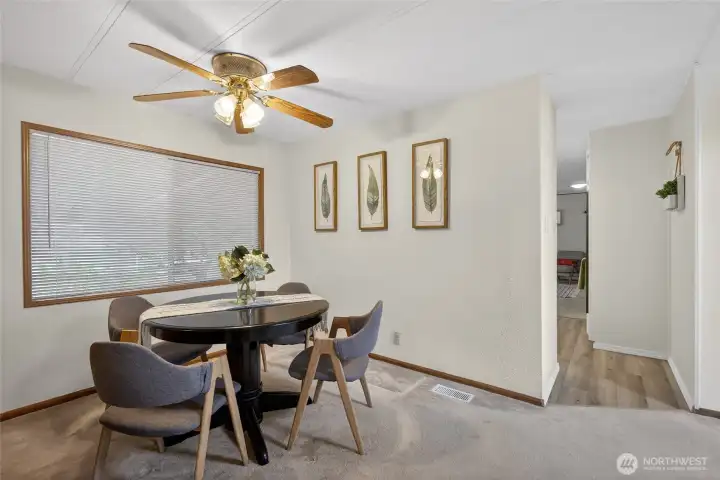 Dining room with a peek into the kitchen.