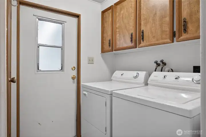 Laundry room/mud room has its own entrance from the carport.