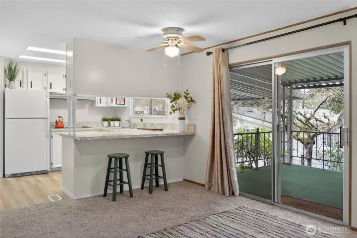 The family room has a slider that goes out to the massive deck.