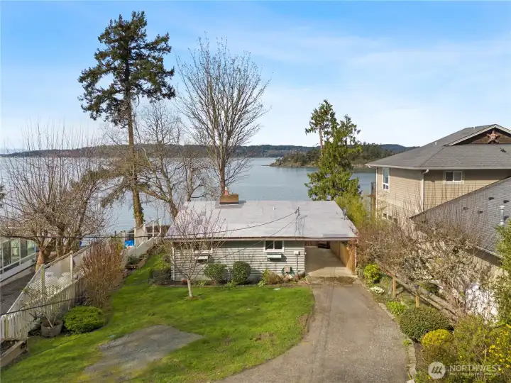 Tucked privatly with yard space and plenty of parking