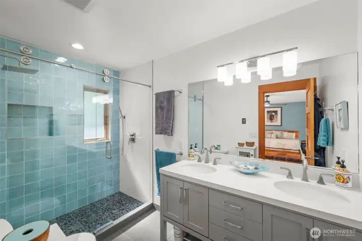 Recently renovated primary bath with radiant heat flooring