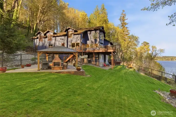 Gorgeous grounds and gazebo complete with outdoor fireplace.