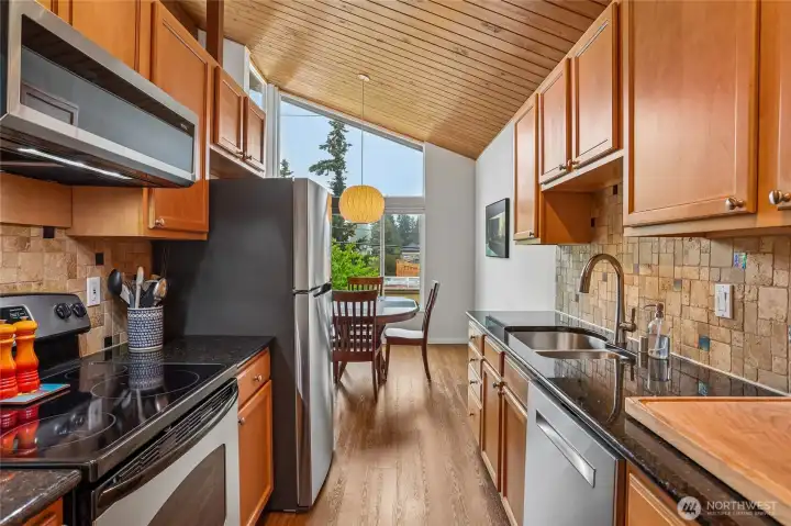 Well appointed kitchen with granite counters, shaker wood cabinets and stainless appliances. Well appointed kitchen with granite counters, shaker wood cabinets and stainless appliances.