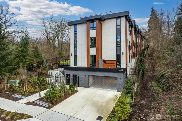 Welcome to the W Townhomes. This architectural statement with modern lines and timeless presence.