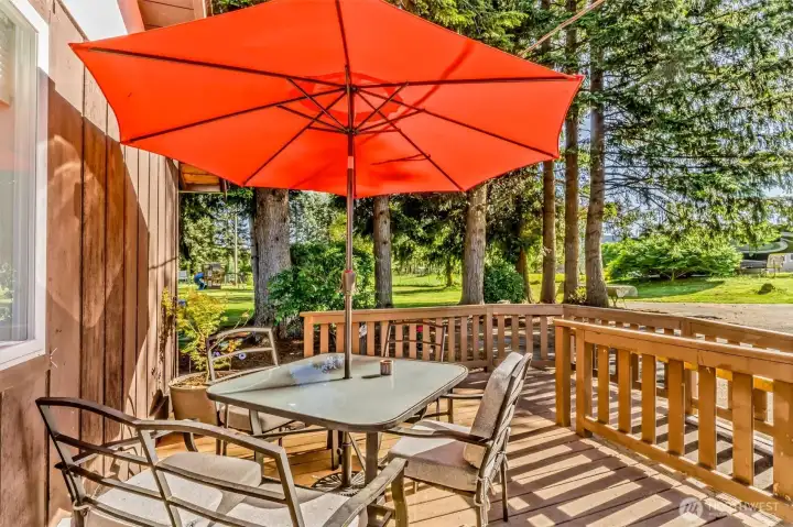 Sun filled deck overlooking the property