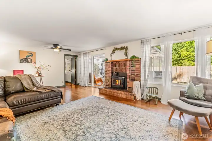 spacious living room with views of gardens
