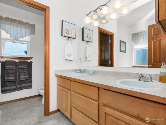 Primary bath with a shower and soaking tub.