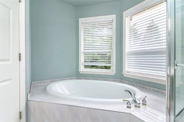Imagine soaking in your private tub, sipping a glass of wine, and taking in the peaceful surroundings—your own serene escape at the end of the day