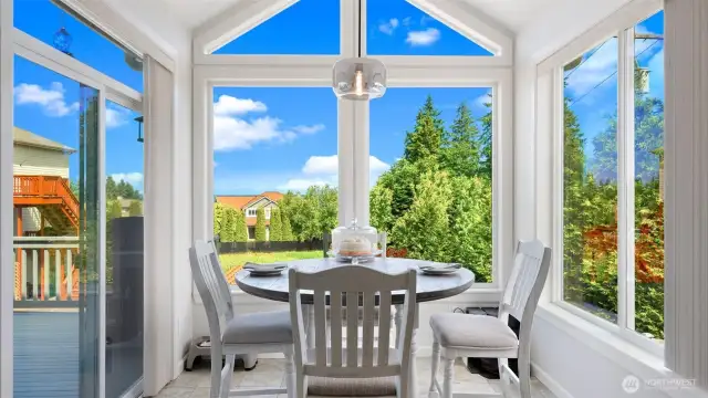 Floor to ceiling windows in the kitchen let in so much light