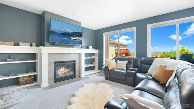 Relax in front of the fireplace in the main living space