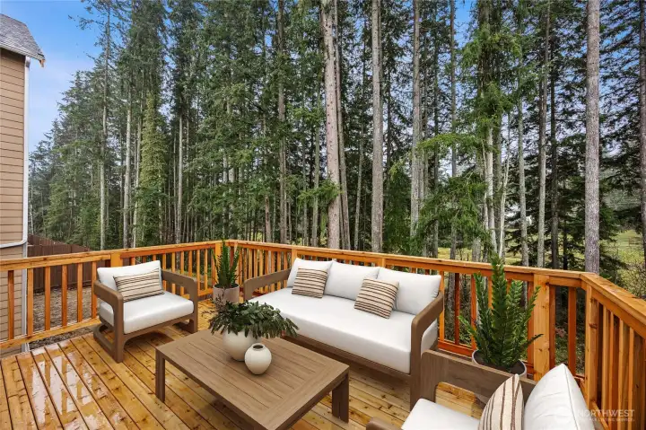 Enjoy main floor private deck and covered patio. Photo's are for representational purposes only. Colors and finishes may differ.