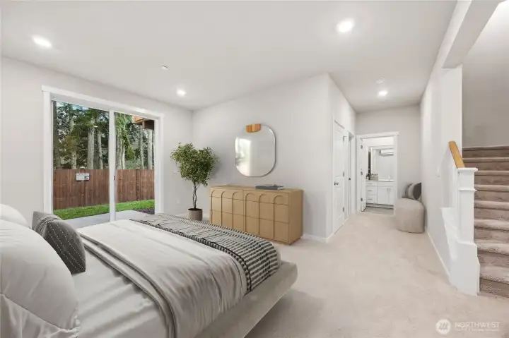Huge bedroom downstairs with a 3/4 bath and additional storage. Walk out to your patio and yard. Photo's are for representational purposes only. Colors and finishes may differ.