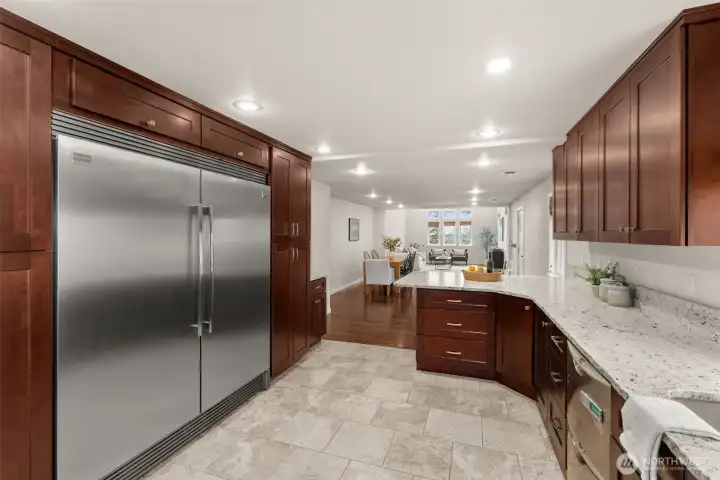 Double oven, range oven, Double Dishwasher, and Double Fridge. Cupboard pull outs and plenty of counter top space.